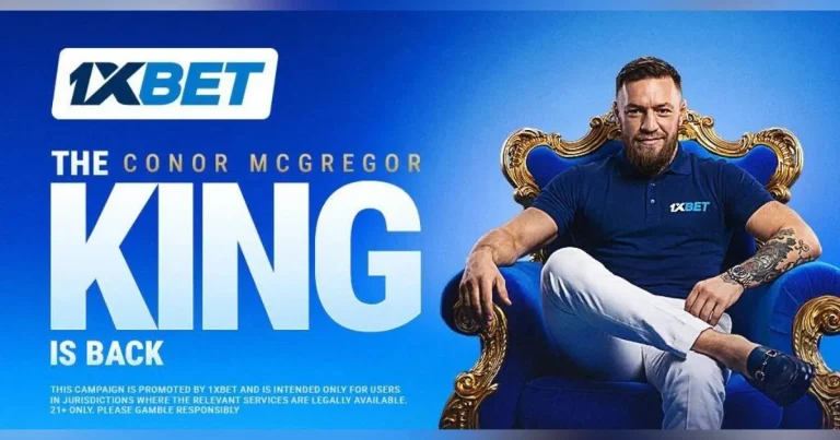 Conor McGregor, conhecido lutador do UFC, é visto em um evento, com um logotipo sutil da 1xBet ao fundo, simbolizando a nova parceria.