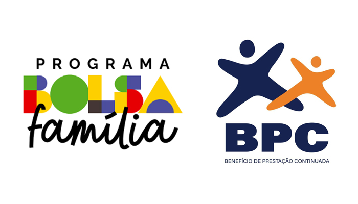 Mãos de uma pessoa segurando cartões do Bolsa Família e BPC, simbolizando o bloqueio de acesso a sites de apostas.