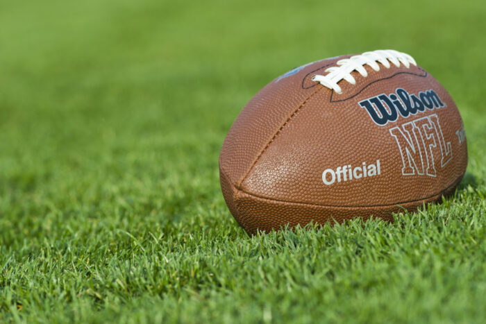 Logotipos da NFL, DraftKings, FanDuel e Fanatics representando as novas parcerias oficiais de apostas para a temporada de 2026